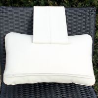 Das Gewicht wird 7 cm von oberen Kissenkante an der Rückseite angebracht.